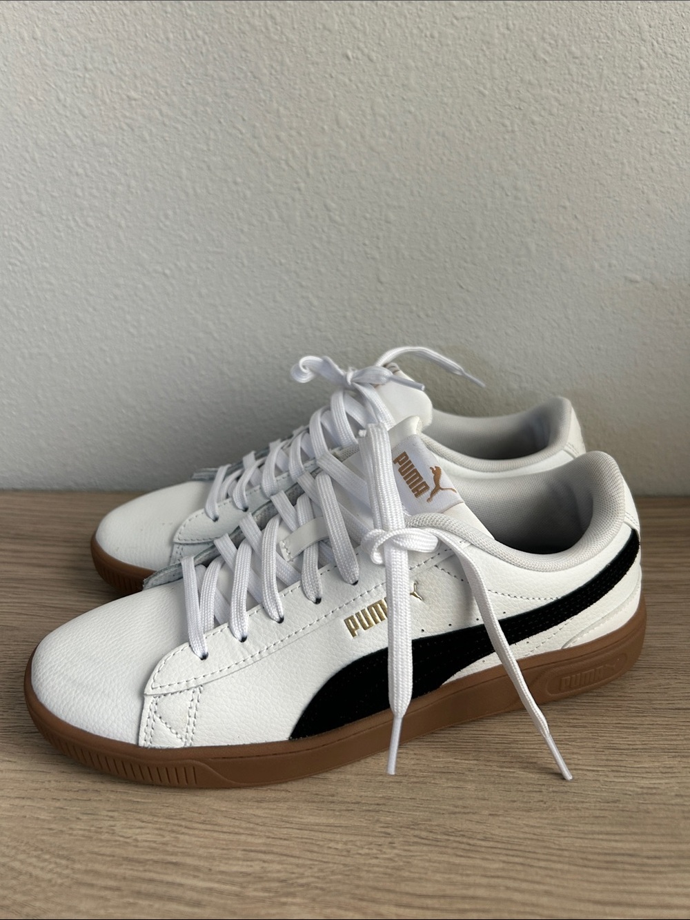 Puma White Sneakers with Black Stripe and Brown Sole